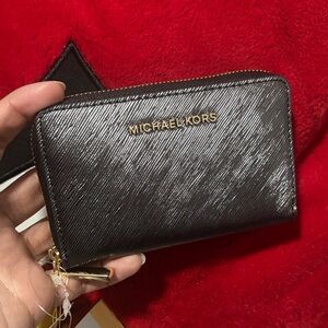 Michael Kors Silver Textured small Wallet.